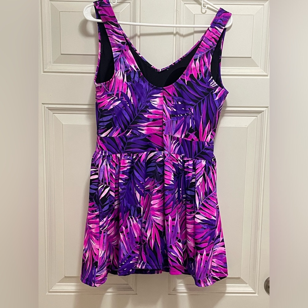 New pinks and multicolored swim dress, size 18. Tags and hygiene strip attached.